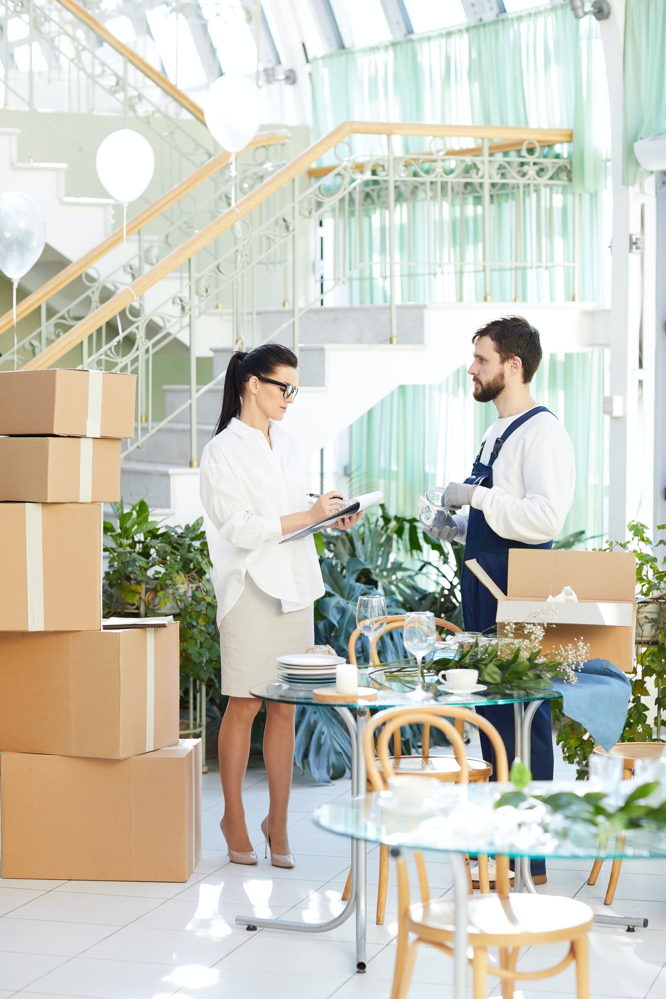 business-lady-asking-mover-about-delivery-order.jpg